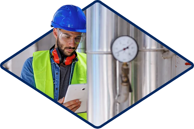 Worker Checking Gauge Oil And Gas