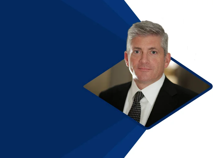 Joel Zimmeran President Ceo Headshot Blue Lft Background Mobile V2