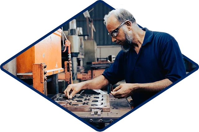 Mc Travel Contacts Man Working In Factory